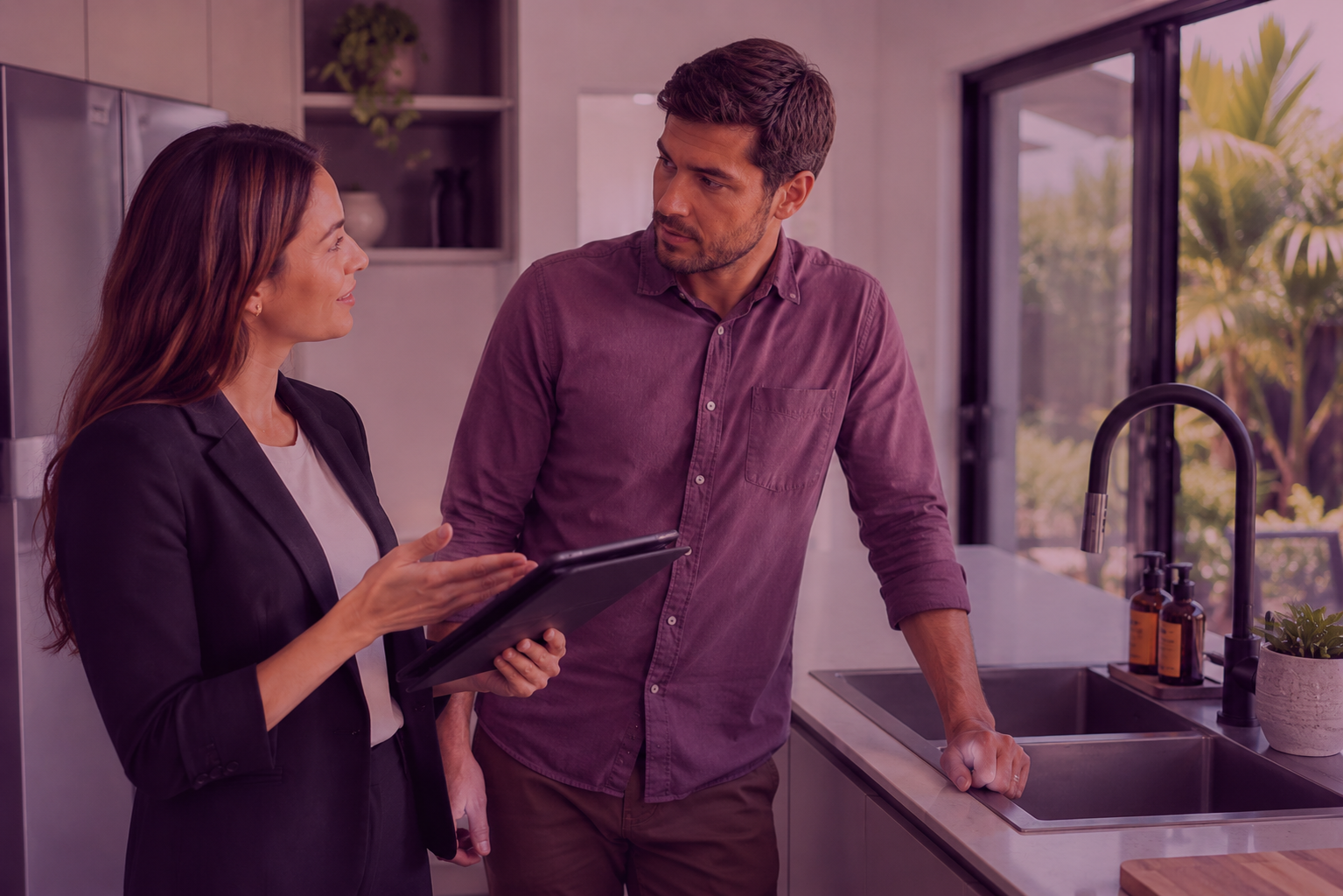 Tenant discussing rental maintenance request with property manager in Townsville